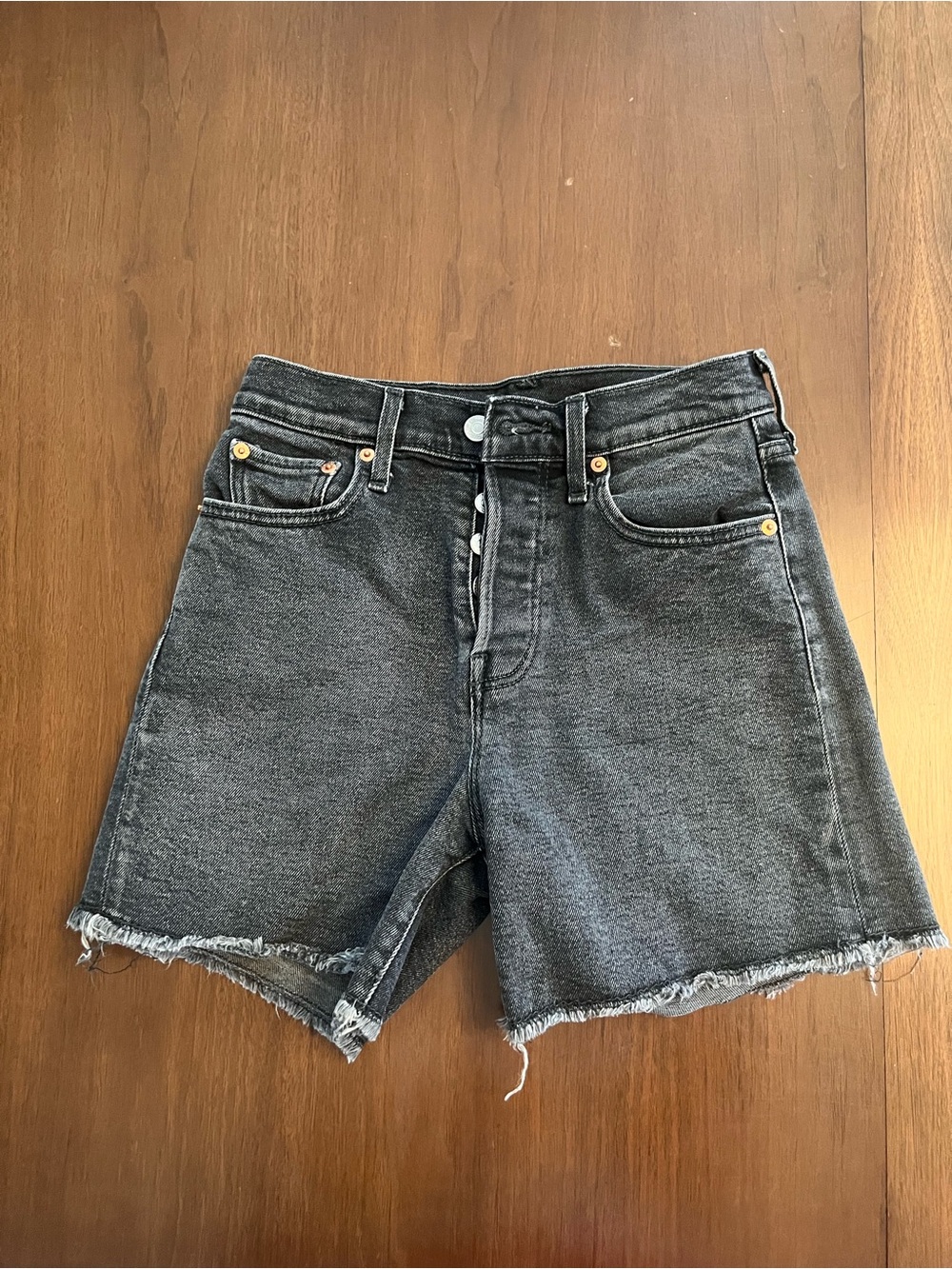 Levi’s faded black jean shorts